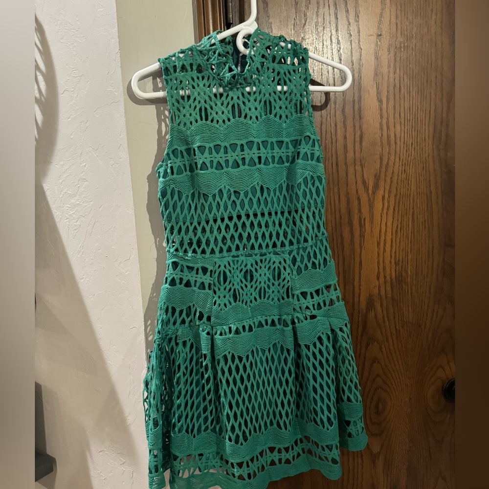 Green dress with cutout detail